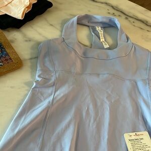 Beautiful sport tank top with tags size10 with bra support